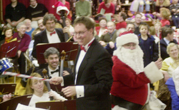 Santa conducts with Isaacson