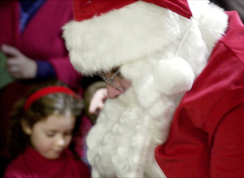 Santa and young girl