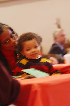 young audience member appreciates concert