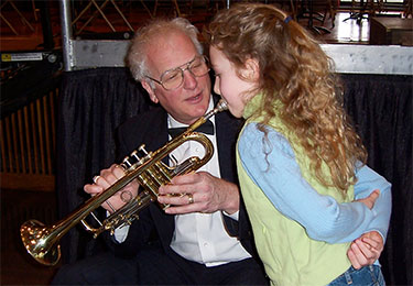 Howard Ostroff demonstrates trumpet
