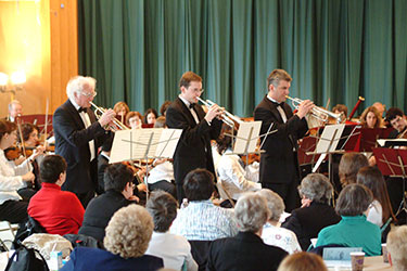 trumpet section performing Bugler's Holiday