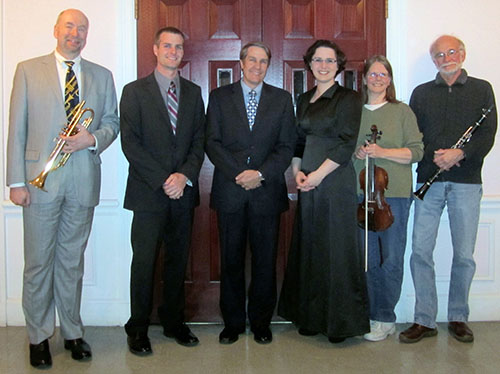 Orchestra members with May Funeral Home representatives, sponsor of this concert.
