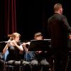 Scott Abrahamson, Director of the Dedham High School Concert Band, conducts "March to the Prince of Wales" performed by members of the Concert Band with members of the Parkway Concert Orchestra.